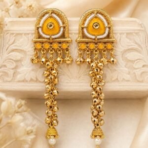 Gold-tone mustard yellow temple style long ghungroo earrings with white beads and pearl jhumka drops